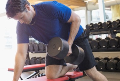 Man exercising with weights.